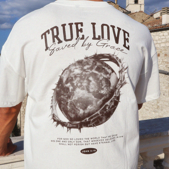 Person wearing a white t-shirt with 'True Love Saved by Grace